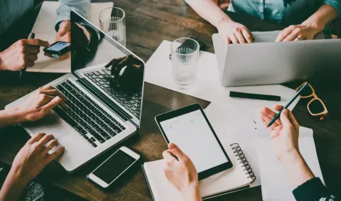 people working on their devices